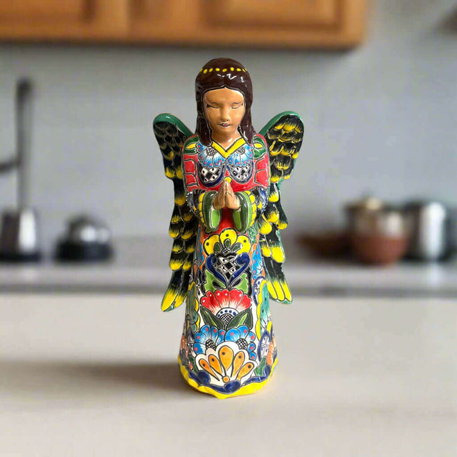 Talavera Angel Statue | Hand-Painted Mexican Ceramic Figurine hand-painted floral ceramic angel with folded hands, bright yellow red blue green Talavera design