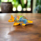 Talavera Armadillo Figurine | Hand-Painted Mexican Decor small hand-painted orange Talavera armadillo with multicolor floral patterns
