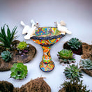 Talavera Bird Bath | Hand-Painted Mexican Pedestal Garden Art - vibrant hand-painted Talavera pedestal with sculpted white birds and floral succulents