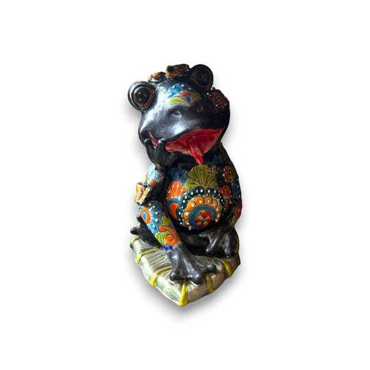 Hand-Painted Talavera Frog Statue | Mexican Ceramic Animal Decor - black hand-painted Talavera frog with colorful floral patterns on pillow