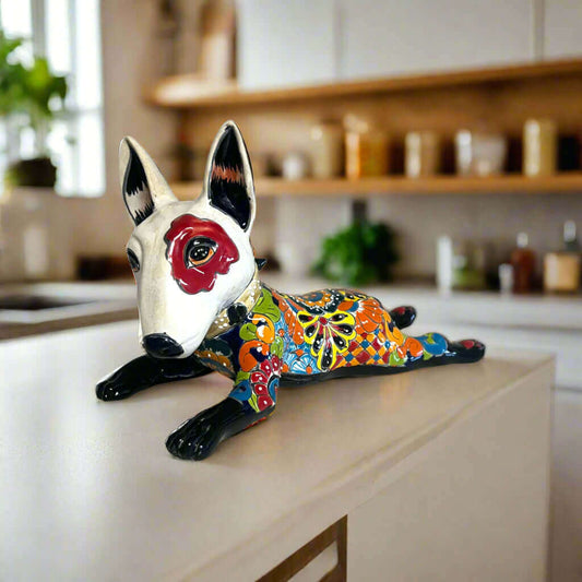 Talavera Bull Terrier Statue | Hand-Painted Colorful Dog Sculpture — handcrafted Talavera bull terrier with red eye patch and vivid floral patterns