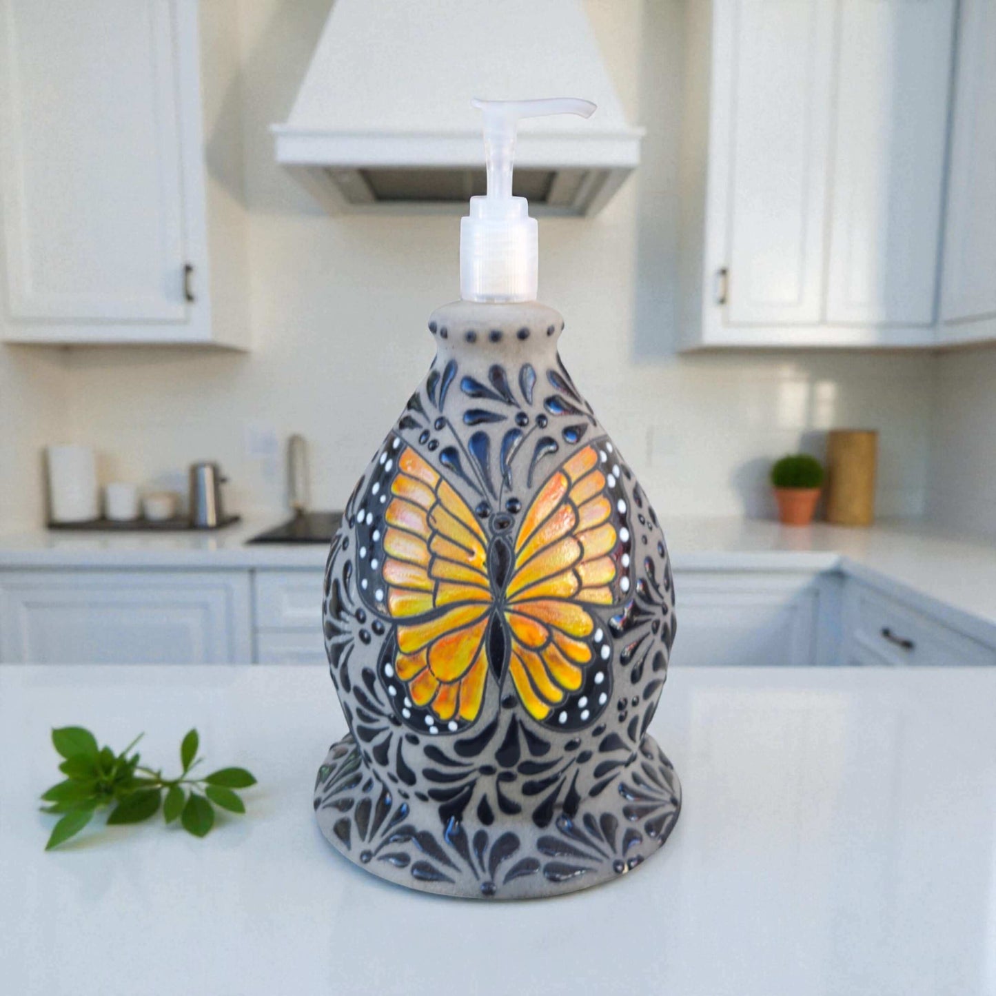 Talavera Butterfly Soap Dispenser | Hand-Painted Ceramic large hand-painted ceramic soap pump with orange butterfly motif on textured white background