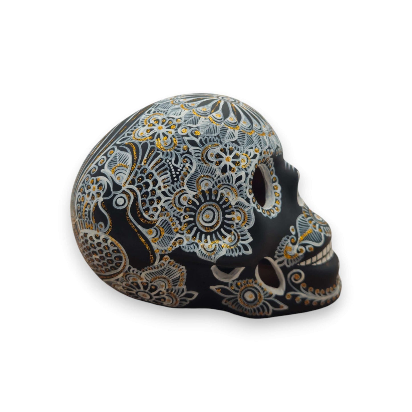Talavera Calavera Skull | Hand-Painted Ceramic Decor - black skull with intricate white and gold floral patterns, handcrafted in Guanajuato, Mexico