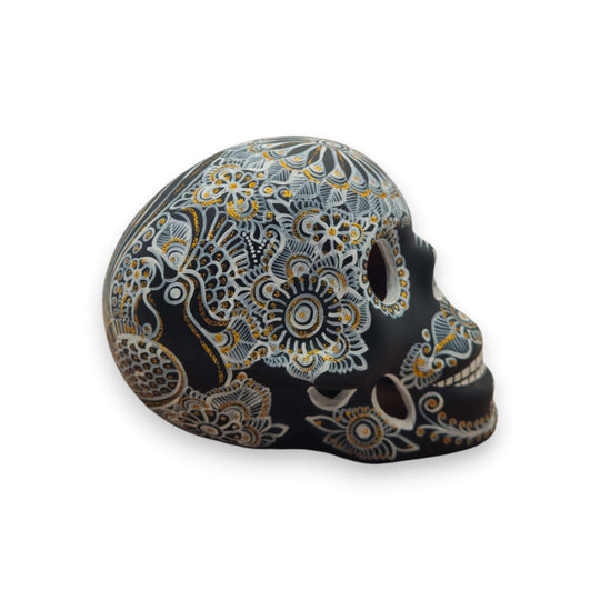 Talavera Calavera Skull | Hand-Painted Ceramic Decor - black skull with intricate white and gold floral patterns, handcrafted in Guanajuato, Mexico