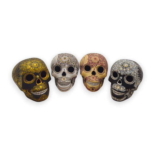 Talavera Calavera Skull | Hand-Painted Ceramic Decor - four hand-painted Talavera skulls with black, white, gold and red floral motifs