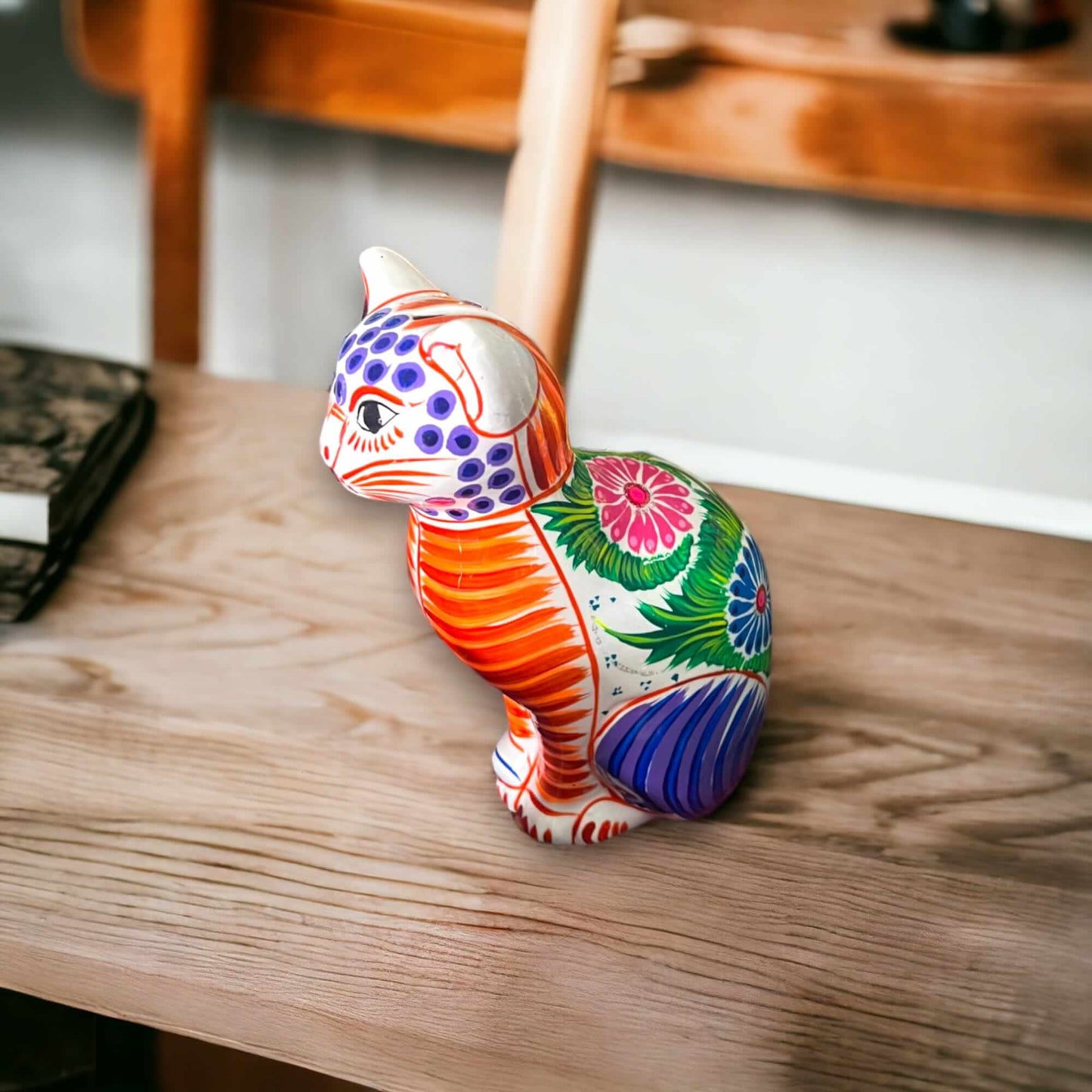Talavera Cat Piggy Bank | Hand-Painted Mexican Ceramic Coin Holder — hand-painted colorful cat coin bank with floral and stripe motifs, kiln-fired lead-free glaze