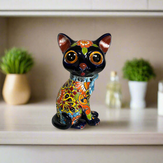 Talavera Cat Statue | Hand-Painted Mexican Folk Art Figurine featuring a hand-painted orange and black floral cat with oversized eyes