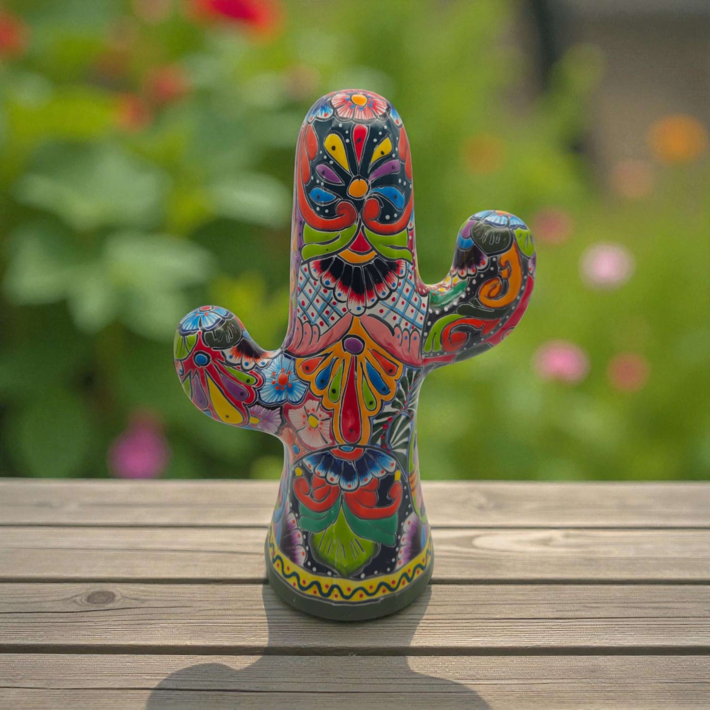 Hand-Painted Talavera Cactus | Vibrant Mexican Ceramic Art - hand-painted green Talavera cactus statue with multicolor floral and geometric motifs on wood