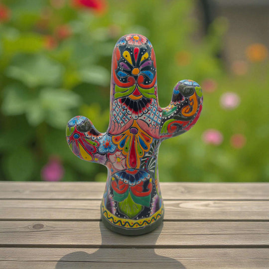 Hand-Painted Talavera Cactus | Vibrant Mexican Ceramic Art - hand-painted green Talavera cactus statue with multicolor floral and geometric motifs on wood