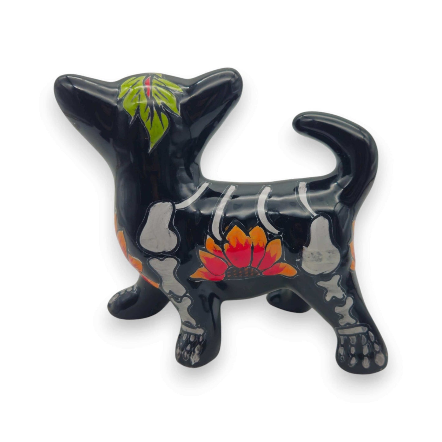 Talavera Chihuahua Figurine | Hand-Painted Day of the Dead Art - glossy black chihuahua with skeletal motifs, orange floral accents, handcrafted Mexican pottery