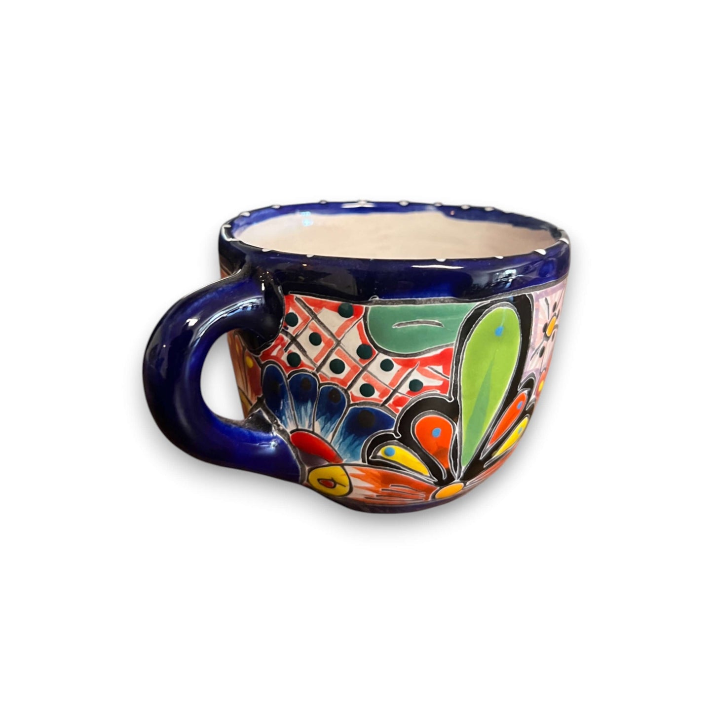 Talavera Coffee Mug | Hand-Painted Mexican Ceramic Cup showing colorful hand-painted floral Talavera pattern, cobalt blue rim and handle, handcrafted in Guanajuato
