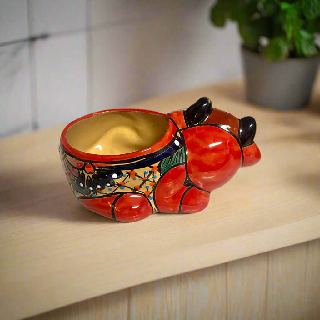 Talavera Cow Planter | Hand-Painted Mexican Ceramic Animal Pot showing bright red hand-painted floral and geometric designs, kiln-fired lead-free glaze