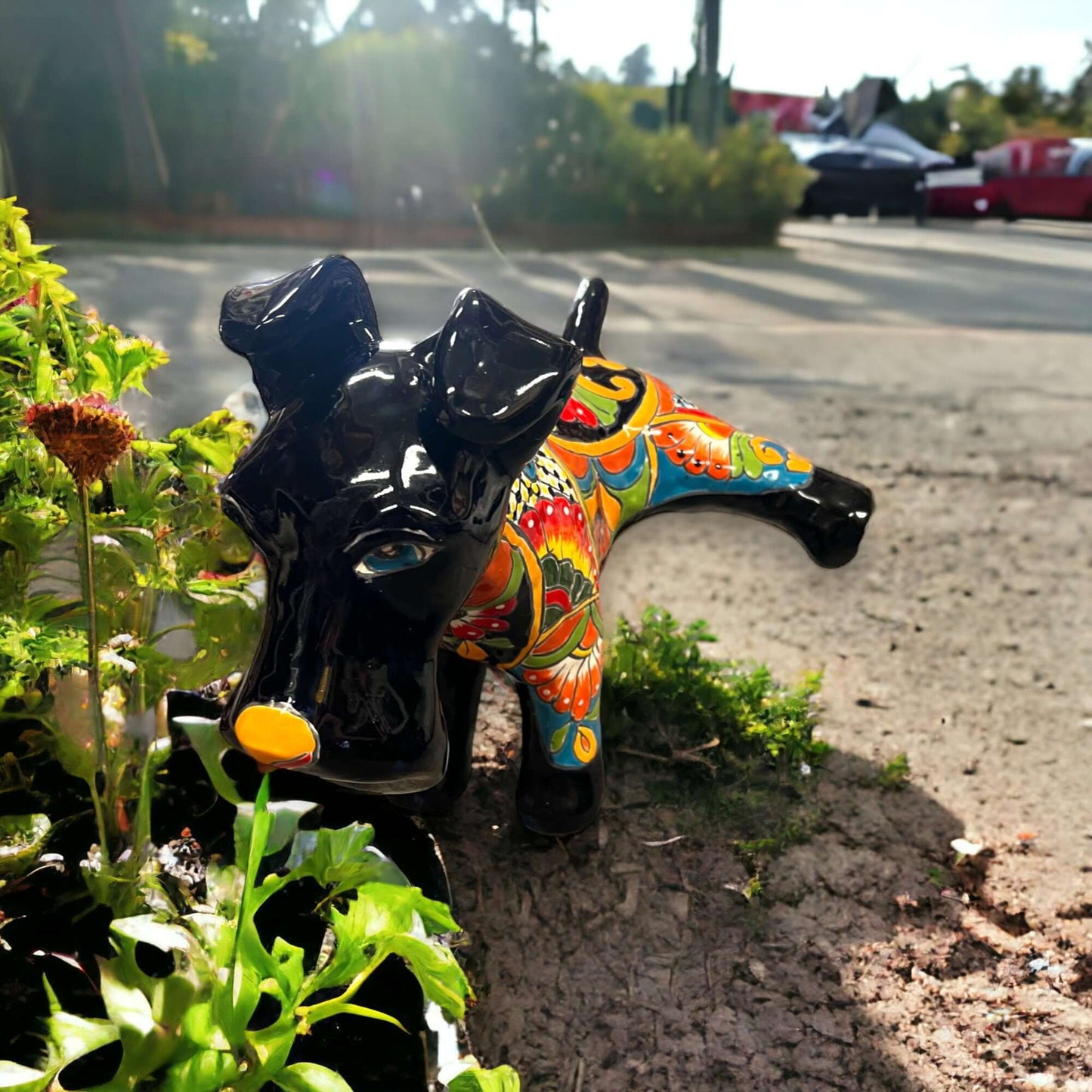 Vibrant Talavera Dog Sculpture | Colorful Hand-Painted Large Mexican Art Piece - hand-painted Talavera dog with bright floral patterns outdoors