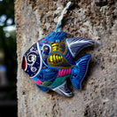 Colorful Talavera Fish Wall Decor | Hand-Painted Guerrero Pottery — vibrant hand-painted blue Talavera fish with coastal motifs, kiln-fired lead-free glaze