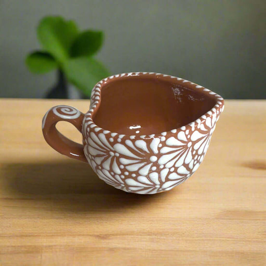 Talavera Heart Mug | Hand-Painted Mexican Coffee Cup hand-painted brown heart-shaped Talavera ceramic cup with white floral design