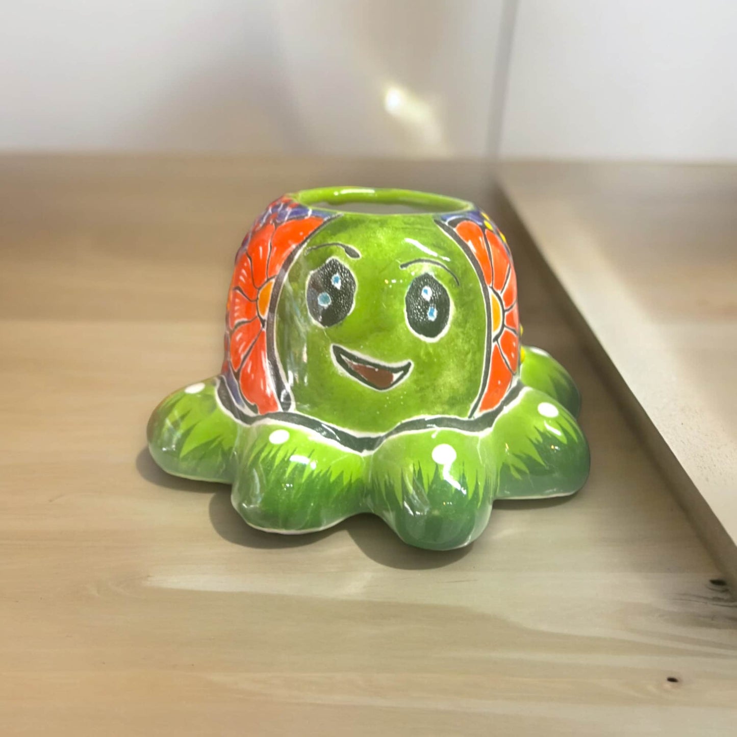 Talavera Octopus Succulent Planter | Hand-Painted Ceramic Pot - hand-painted green octopus planter with orange details, kiln-fired lead-free glaze