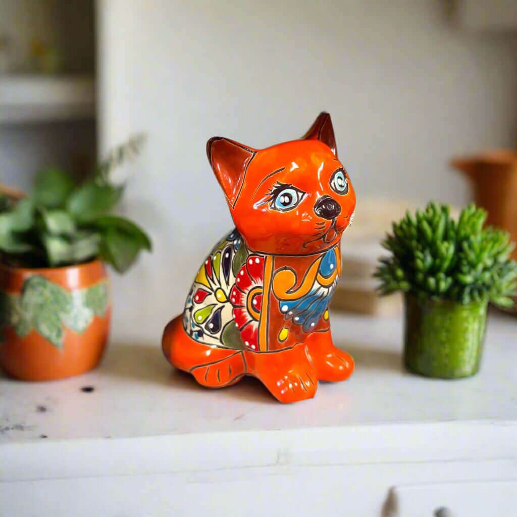 Talavera Cat Figurine | Hand-Painted Mexican Folk Art Home Decor — vibrant orange hand-painted Talavera cat with floral patterns on mantel