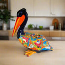 Talavera Pelican Statue | Hand-Painted Mexican Ceramic Decor - vibrant hand-painted Talavera pelican with floral and geometric patterns