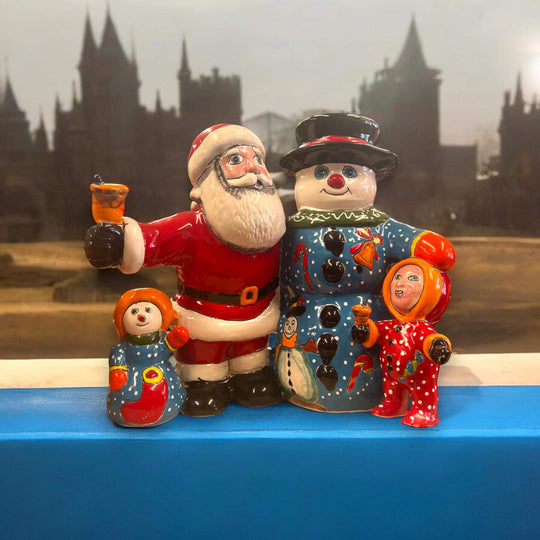 Talavera Santa & Snowman Statue | Hand-Painted Christmas Decor - hand-painted Talavera Santa and snowman family figurines, kiln-fired lead-free glaze