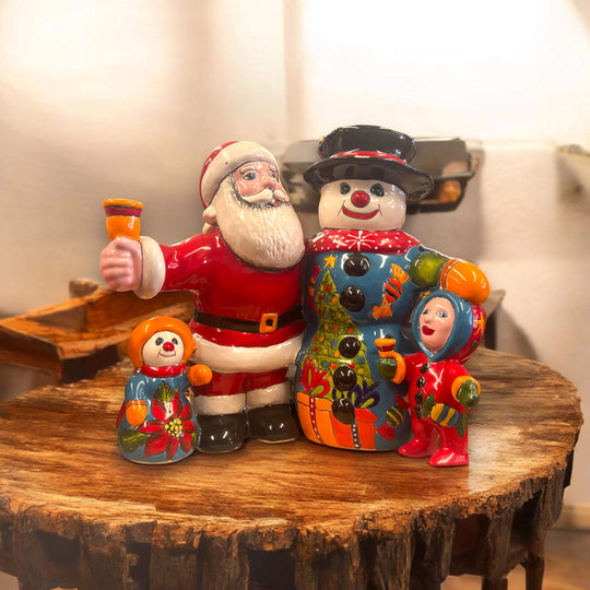 Talavera Santa & Snowman Statue | Hand-Painted Christmas Decor - hand-painted Talavera Santa and snowman family on wooden slice, bright festive colors