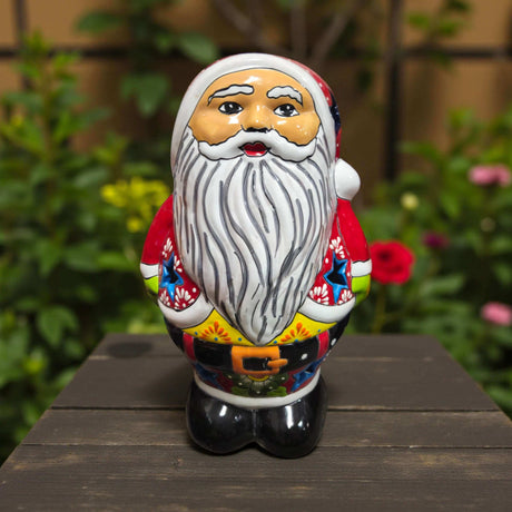 Talavera Santa Statue | Hand-Painted Holiday Decor - colorful hand-painted Talavera Santa with white beard, red coat and floral motifs