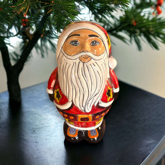 Talavera Santa Statue | Hand-Painted Holiday Decor - hand-painted Talavera ceramic Santa with white beard, red coat and floral star motifs