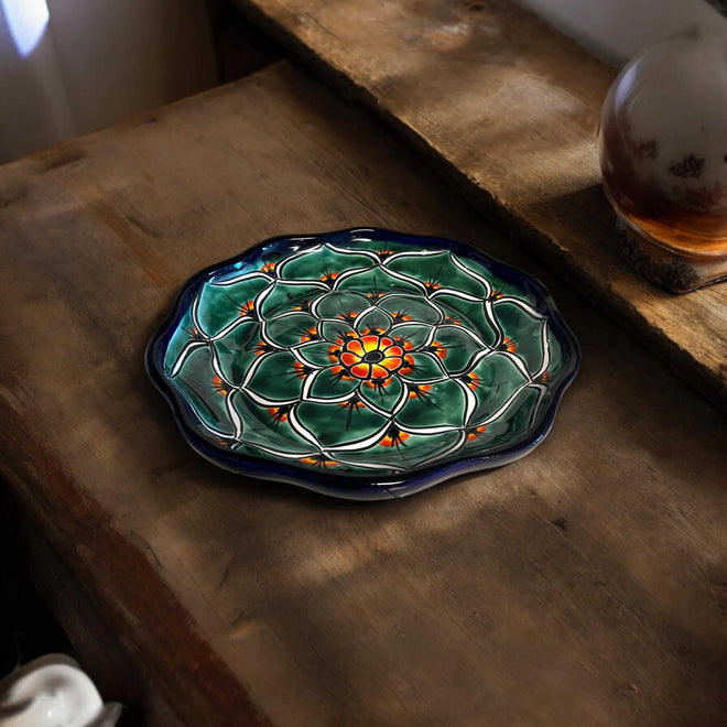Talavera Serving Plate | Hand-Painted Peacock Design on rustic wooden table, vibrant green and blue traditional Talavera pattern