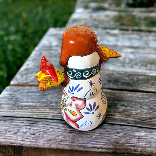 Hand-Painted Talavera Snowman Statue | Festive Christmas Decor (Medium) - hand-painted floral snowman on wooden table, artisan Talavera glaze