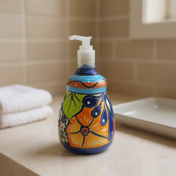 Talavera Soap Dispenser | Hand-Painted Mexican Ceramic Bathroom Decor — hand-painted multicolor floral Talavera soap dispenser on bathroom counter