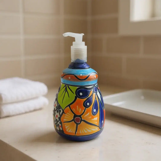 Talavera Soap Dispenser | Hand-Painted Mexican Ceramic Bathroom Decor — hand-painted multicolor floral Talavera soap dispenser on bathroom counter