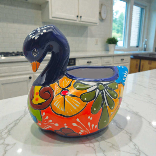 Talavera Swan Planter | Colorful Hand-Painted Mexican Pottery - hand-painted cobalt blue and floral ceramic swan planter on kitchen counter