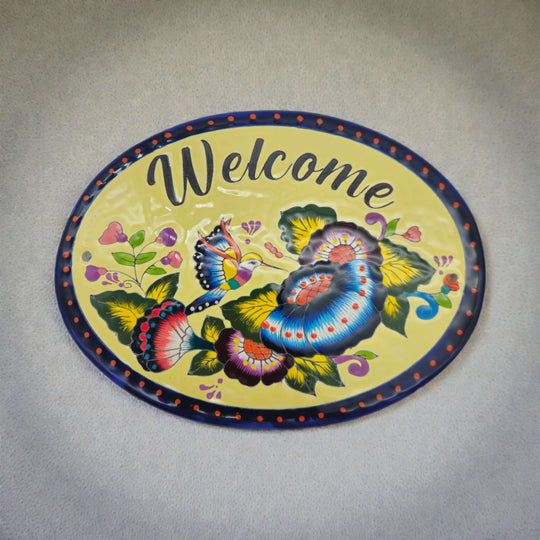 Colorful Talavera Welcome Plaque | Hand-Painted Wall Sign — oval hand-painted Talavera ceramic plaque with floral motif and bright blues, greens, oranges