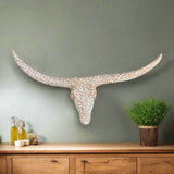 Terracotta Longhorn Wall Art | Hand-Painted Mexican Bull Skull displayed on gray wall with floral terracotta pattern over console