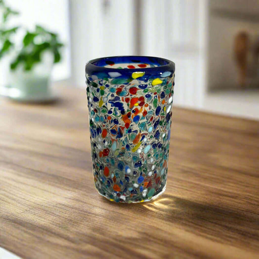 Confetti Pebbled Glass | Blue Rim Hand-Blown Mexican Tumbler - handmade lead-free glass tumbler with colorful confetti pebbled design and blue rim