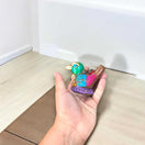 Small Aztec Bird Whistle | Handcrafted Cultural Ceramic Decor - colorful handcrafted Aztec bird whistle held in hand, traditional painted ceramic decor