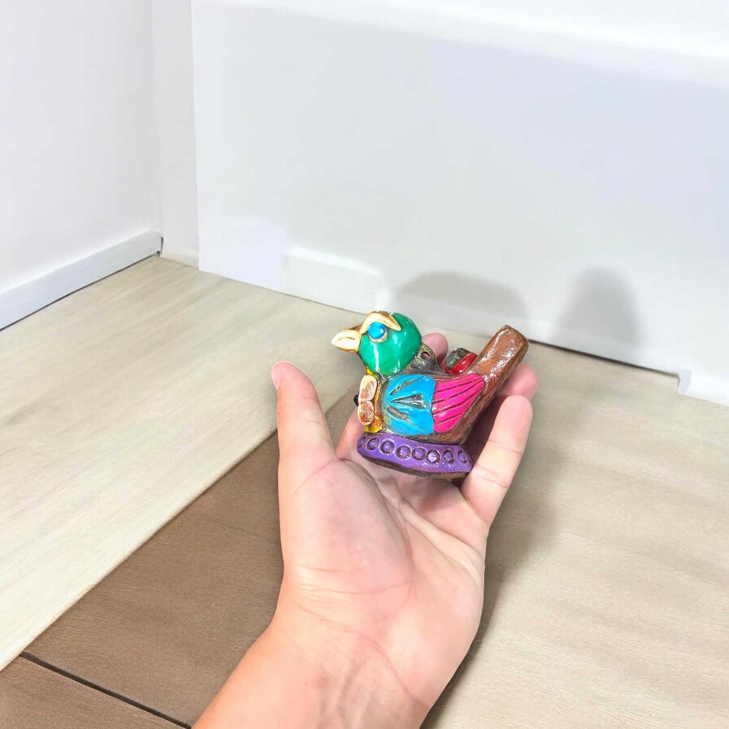 Small Aztec Bird Whistle | Handcrafted Cultural Ceramic Decor - colorful handcrafted Aztec bird whistle held in hand, traditional painted ceramic decor