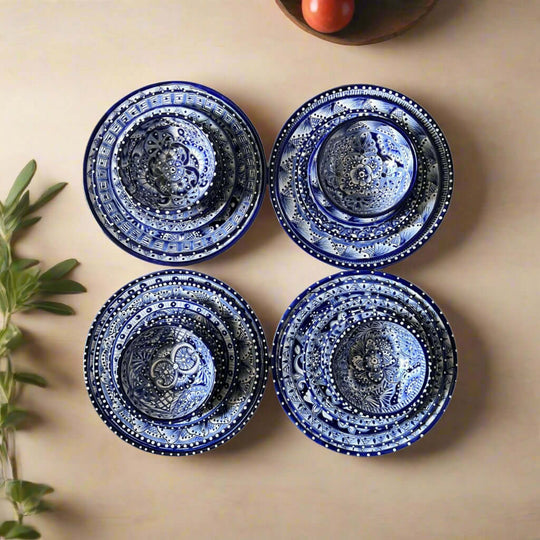 Talavera Dinnerware Set | 40-Piece Blue & White Tableware for 8 - overhead view of four hand-painted blue and white Talavera bowls