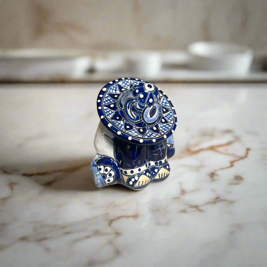 Handcrafted Talavera Panchito Figurine | Blue & White Pottery - hand-painted blue and white sleeping man figurine from Guanajuato, Mexico