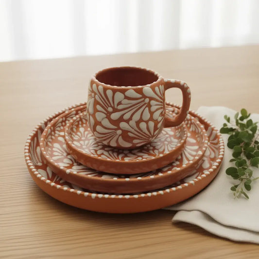 Handcrafted Talavera Dinnerware Set | Brown & White 4-Piece - rustic brown cup and stacked plates with white floral patterns on wooden table