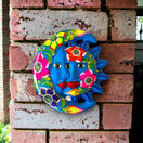 Handcrafted Guerrero Sun and Moon Eclipse Art | Mexican Hand-Painted Pottery - vibrant blue hand-painted Guerrero sun and moon pottery wall decor