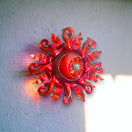 Vibrant Sun Wall Art | Handcrafted Mexican Metal Decor (24-inch Diameter) hanging red sun sculpture, hand-painted kiln-fired lead-free glaze