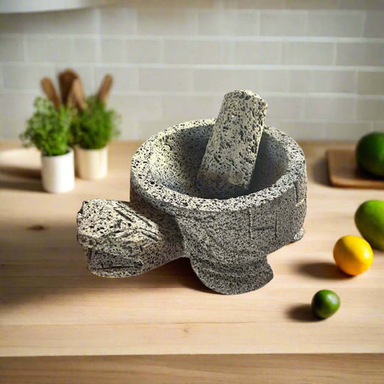 Sea Turtle Stone Mortar & Pestle | Handcrafted Molcajete handcrafted volcanic stone molcajete with turtle design on kitchen counter