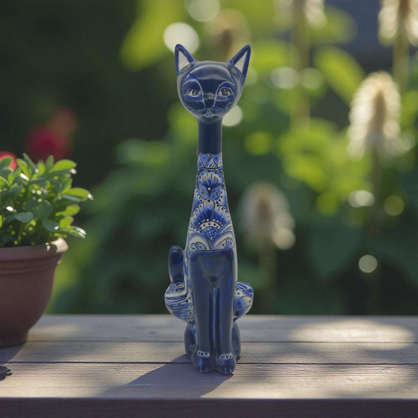 Colorful Talavera Cat Statue | Handcrafted Mexican Art - tall dark handcrafted Talavera cat with vivid blue floral and geometric patterns