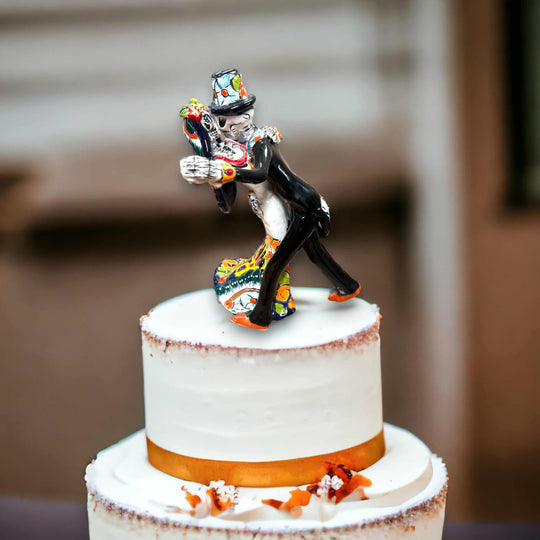Handcrafted Talavera Cake Topper | Unique Hand-Painted Wedding Art - hand-painted Día de los Muertos couple topper on white wedding cake