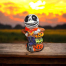 Handcrafted Talavera Skeleton Statue | Vibrant Day of the Dead Calavera Decor - hand-painted Mexican Talavera calavera holding colorful jack-o-lanterns