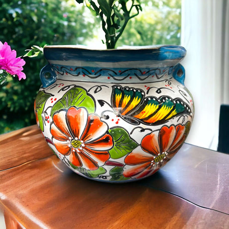Handcrafted Talavera Decor Planter | Artisan-Made Mexican Flower Pot featuring hand-painted orange flowers, green leaves and butterfly motif