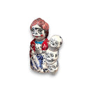 Handcrafted Talavera Frida Statue | Colorful Day of the Dead Calavera Skull Decor handcrafted hand-painted Talavera Frida with stacked skulls and floral motifs
