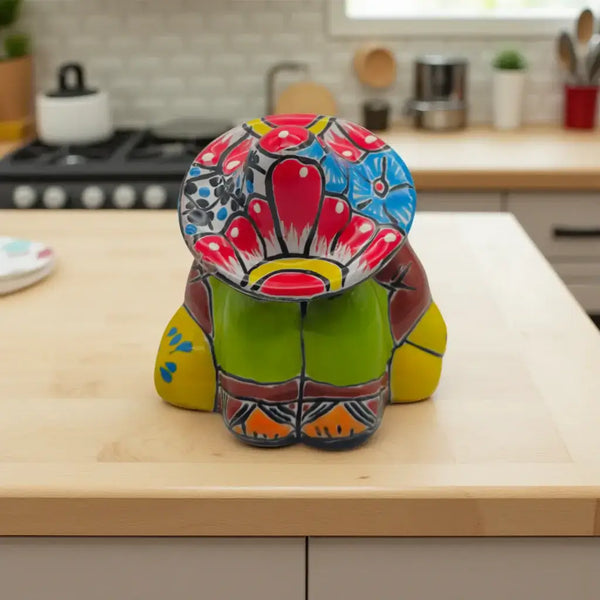 Talavera Panchito Figurine | Handcrafted Mexican Pottery - colorful sleeping man ceramic with vivid blues reds greens and yellows