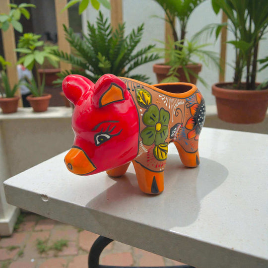 Handcrafted Talavera Pig Planter | Mexican Terracotta Art - colorful hand-painted pig planter with sunflowers and butterflies on terracotta