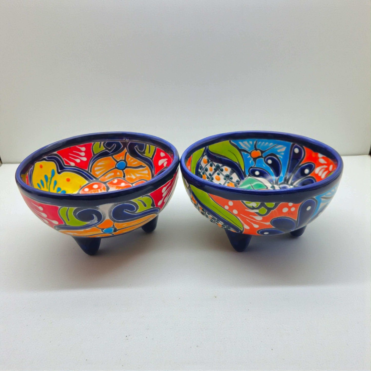 Talavera Salsa Bowl | Handcrafted Mexican Molcajete - pair of hand-painted three-legged vibrant orange green blue ceramic salsa bowls